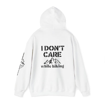 I DON'T CARE WHILE HIKING Unisex Heavy Blend™ Hooded Sweatshirt