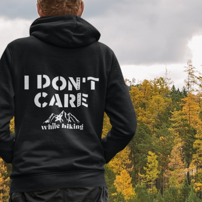 I DON'T CARE WHILE HIKING Unisex Heavy Blend™ Hooded Sweatshirt